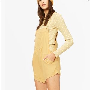 Billabong Wild Pursuit Romper. Color is Gold Dust. Size Large